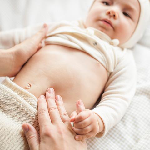 Baby gets tummy massage
